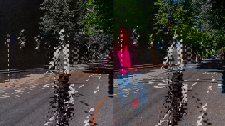 Female cyclist in cycle lane