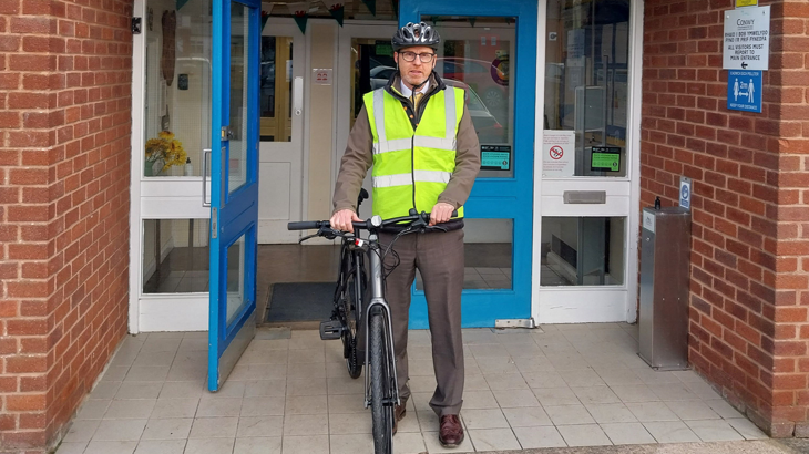 Headteacher in Ysgol Sant Elfod with new e-bike 