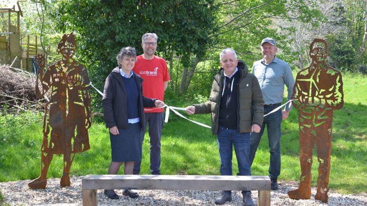 people gather to cut the ribbon on brand new portrait bench in Lawrence Weston Bristol.