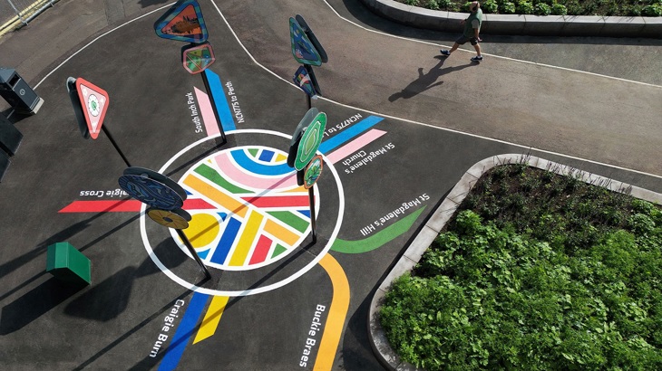 An artwork installation at Craigie Place, Perth, that points out the direction of National Cycle Network routes