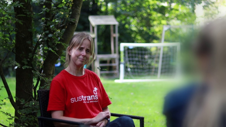 Project Officer Lucy sitting and listening to a resident of the women and children's refuge share their experiences of the cycling sessions.