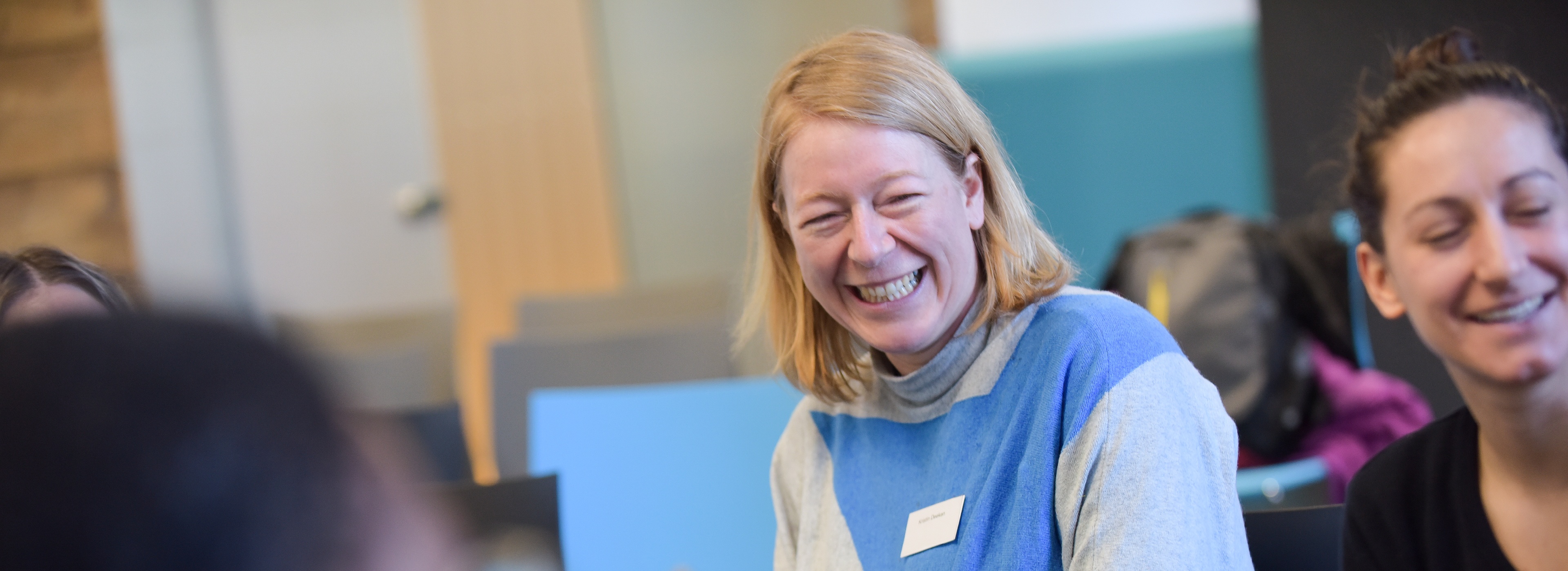 two female attendees at a professional networking event