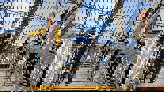 commuter walking bike down the steps at Waverley station