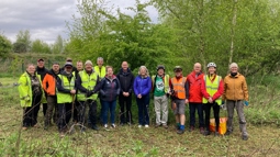 A group shot of Walk Wheel Cycle Trust staff and volunteers at the celebration event for 20 years of volunteering in northeast Wales.