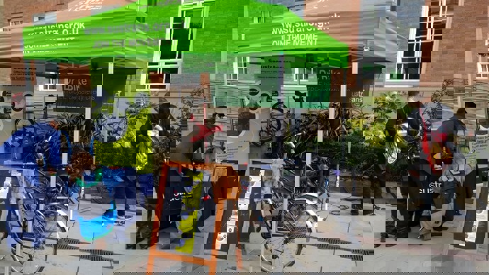 Dr Bike tent in Derby with a bike outside 