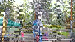 A man cycles through CS Lewis square in Belfast