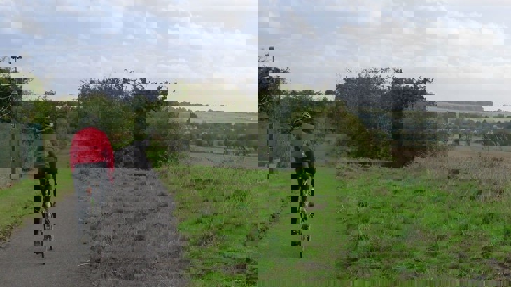 A man cycles along the Swindon to Marlborough path 