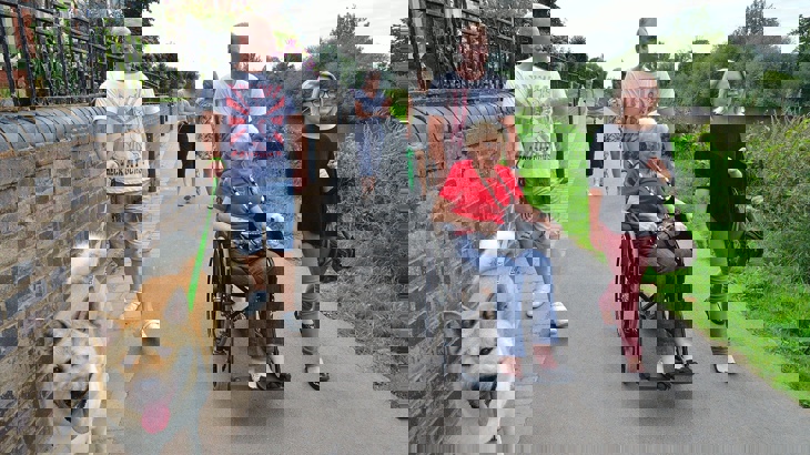 People using a traffic-free path next to a canal