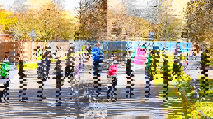 Children enjoying the space created by removing cars from the road