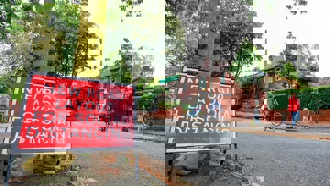 Road sign reading New road layout for social distancing