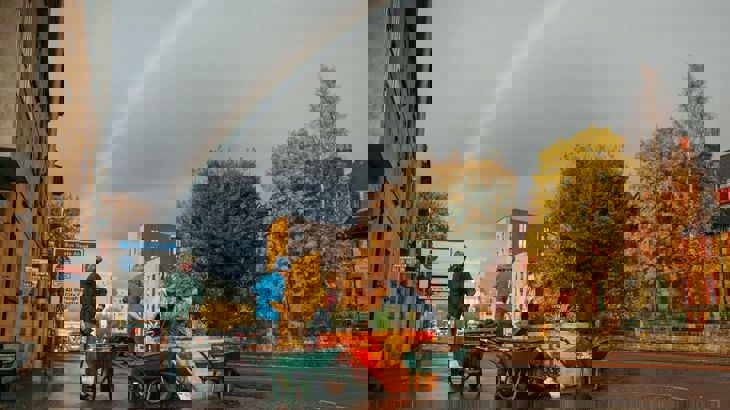 Staff and volunteers from Glasgow's Hidden Garden set up planters off Victoria Road