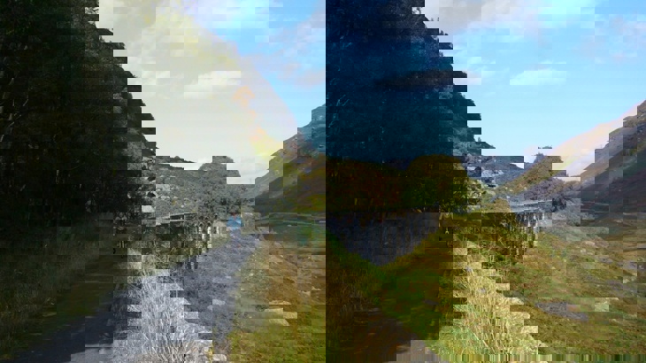 Cyclist on National Route 7, Callander to Killin