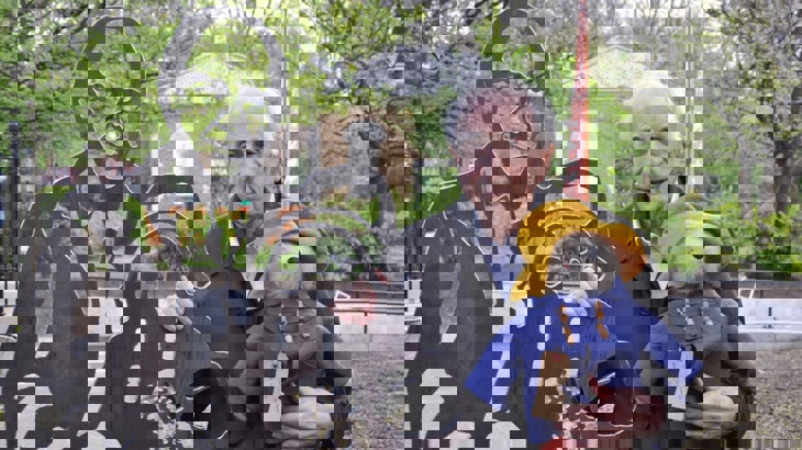 Michael Bond with Paddington Bear at portrait bench