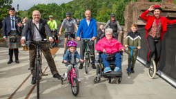 Active Travel Minister Patrick Harvie opens the Bowline with members of the local people walking, wheeling and cycling.