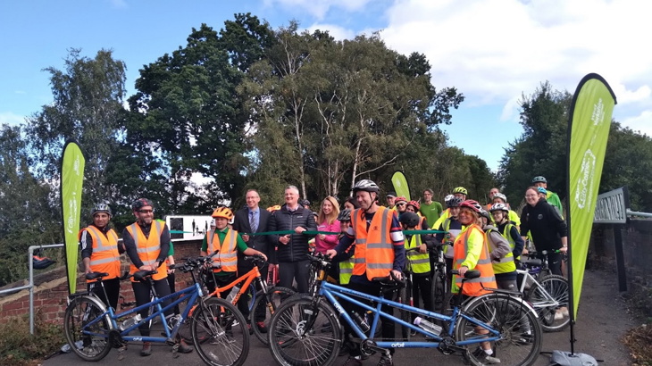 A group of cyclists celebrate the opening of the Castleford Greenway