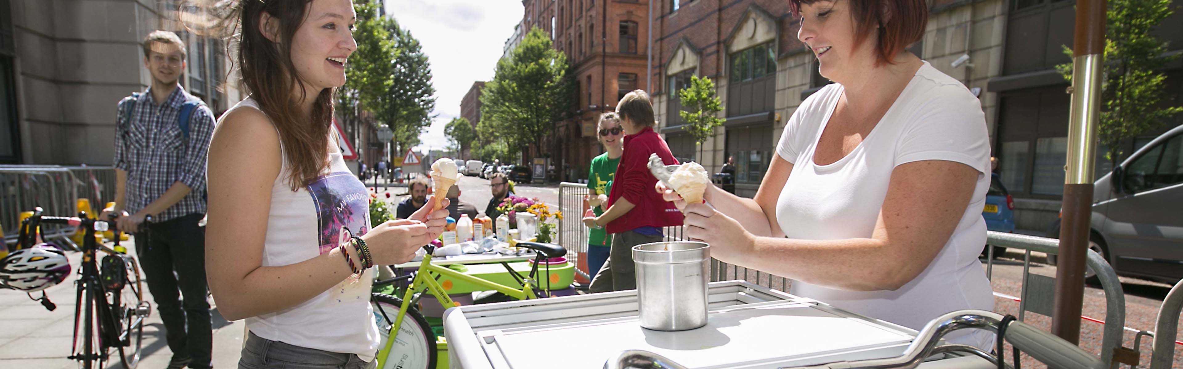Lady buying ice cream on a traffic-free street©2018, Brian Morrison, all rights reserved