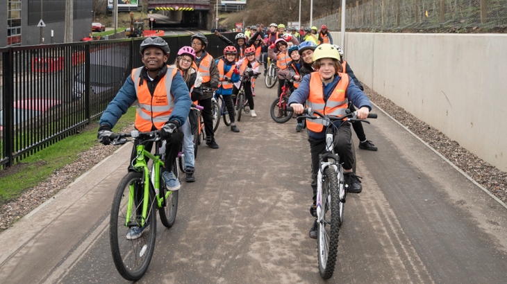 Pupils from local Dalry schools cycle on the new walking, wheeling and cycling link - the Roseburn to Union Canal active travel route.